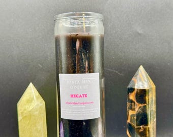 May include: A black glass candle with a white label that reads "Mystic Man Conjure" and "Hecate" with the website "MysticManConjure.com".