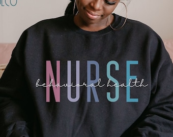 May include: Black sweatshirt with the text "NURSE behavioral health" in rainbow colors.