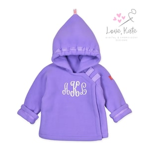 May include: A purple fleece hooded jacket with a white monogram "AKL" on the front. The jacket has a ribbon trim around the hood and a snap closure.