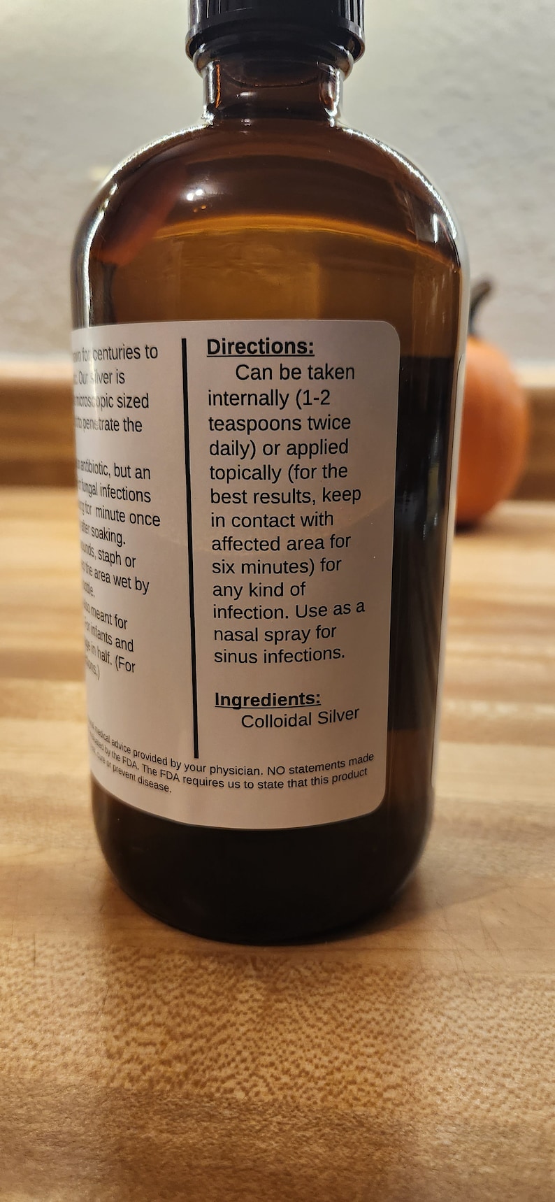 May include: A brown glass bottle with a white label that reads "Directions: Can be taken internally (1-2 teaspoons twice daily) or applied topically (for the best results, keep in contact with affected area for six minutes) for any kind of infection. Use as a nasal spray for sinus infections. Ingredients: Colloidal Silver".