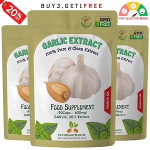 May include: Three pouches of garlic extract supplement with a 20% off sale label. The pouches are beige with a white label that says "Garlic Extract 100% Pure & Clean Extract" and features a photo of garlic cloves. The label also says "Food Supplement (90Caps - 600mg) Garlic, 20:1 Extract" and "SexyBeautifulMe www.sexybeautifulme.co.uk".