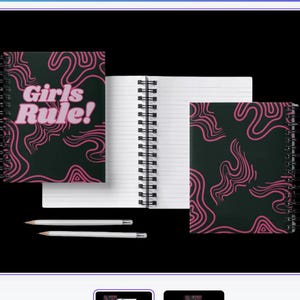 May include: Two black and pink spiral notebooks with a pink and black abstract pattern. One notebook has the text "Girls Rule!" in pink letters.