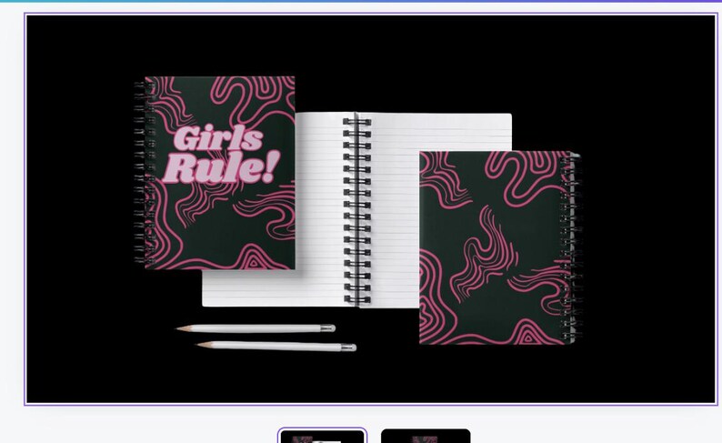 May include: Two black and pink spiral notebooks with a pink and black abstract pattern. One notebook has the text "Girls Rule!" in pink letters.