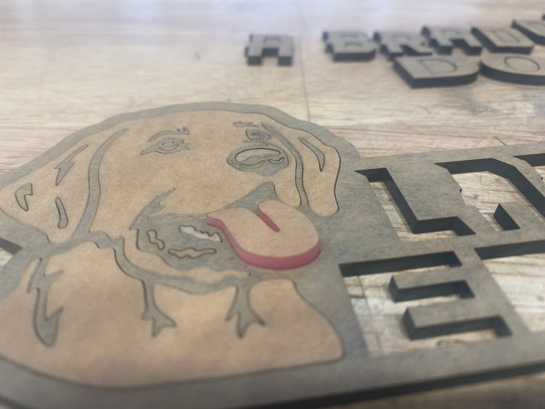 May include: A wooden sign with a cutout of a dog's head and the text "A Brand New Dog Life" in black lettering.