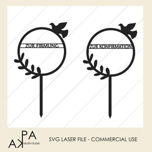 May include: Two black laser cut cake toppers with a dove and a wreath. The text on the toppers reads "Zur Firmung" and "Zur Konfirmation".
