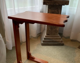 Couch table, end table, snack table, homework table, eating dinner in front of the television table and game table.