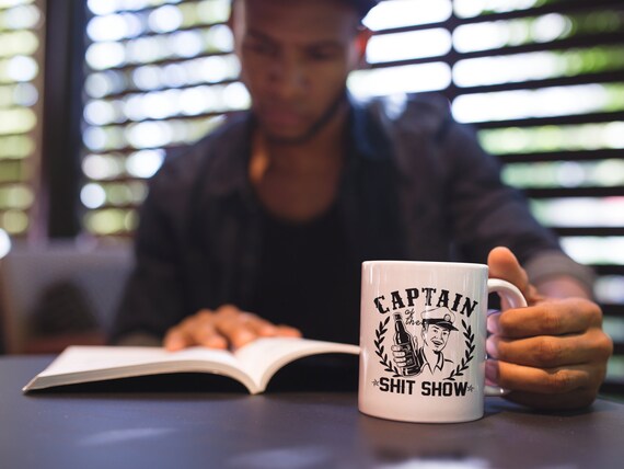 Captain of The Shit Show Coffee Mug