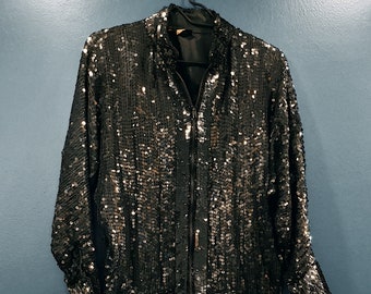 Black sequined silk bomber jacket.