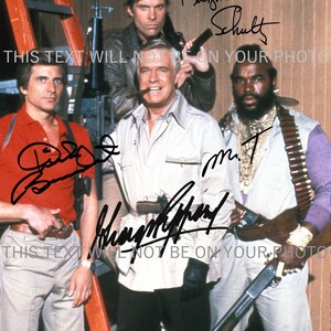 May include: A group photo of four men, each with a signature. The men are dressed in various outfits, including a red shirt, a tan jacket, and a purple and white outfit. One man is smoking a cigar. Weapons are visible.