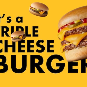May include: A triple cheeseburger with three layers of cheese, beef patties, pickles, and condiments, on a sesame seed bun. The image has a yellow background with the text "It's a TRIPLE CHEESE BURGER."