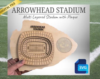 May include: A multi-layered wooden model of Arrowhead Stadium, home of the Kansas City Chiefs. The model features a detailed outline of the stadium, including the seating sections and the field. The model also includes a small plaque with the stadium's name.
