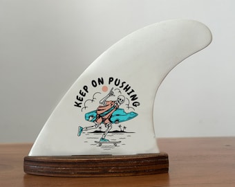 "Keep On Pushing" decorated surf fin