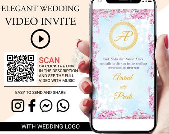 May include: A mobile phone screen displaying a wedding invitation with a floral design. The invitation reads "Smt. Nisha shri Naresh Arora cordially invite you to the wedding celebration of their son Arvind with Preeti".