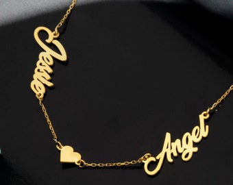May include: Gold necklace with two names, "Jessie" and "Angel", separated by a heart charm.