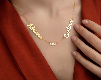 May include: Gold necklace with two names, "Adriana" and "Carlina", connected by an infinity symbol.
