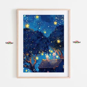 May include: A framed art print featuring a whimsical illustration of two cartoon rabbits on a rooftop under a starry night sky. The artwork is dominated by shades of blue and yellow, with hanging star-shaped lights and lush trees.