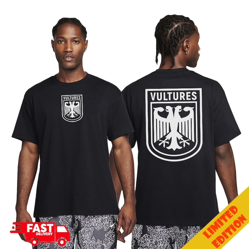 May include: Black t-shirt featuring a white eagle graphic and the text "VULTURES" on the front and back. The eagle graphic is a stylised version of the German national emblem. The shirt is labelled "LIMITED EDITION".