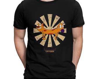 May include: Black t-shirt with a retro-style graphic of Catdog from the cartoon series. The graphic features Catdog in a split-screen style with the text "Catdog" below.