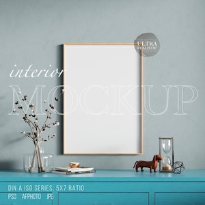 Wood Frame Mockup In Retro Postmodern Interior, Vertical Poster Frame Mockup, Digital Print Mockup On Lake Blue Cabinet And Sand Clock Decor