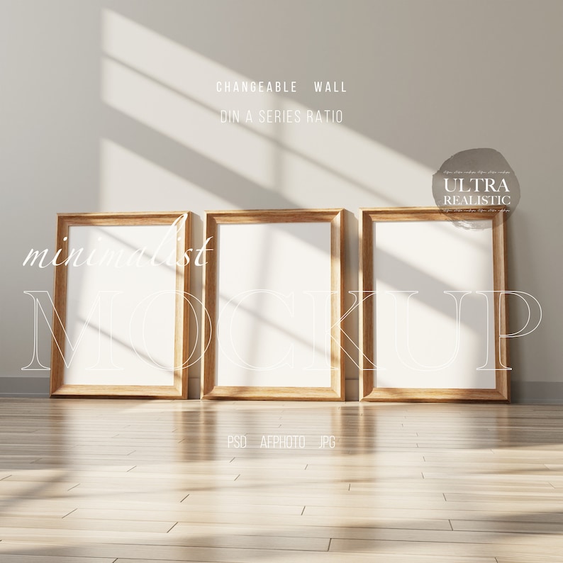 May include: Three wooden picture frames with white mounts and blank white spaces inside. The frames are on a light wood floor with a white wall behind them. The text "CHANGEABLE WALL DIN A SERIES RATIO" is at the top of the image. The text "ULTRA REALISTIC" is in a circle at the top right of the image.