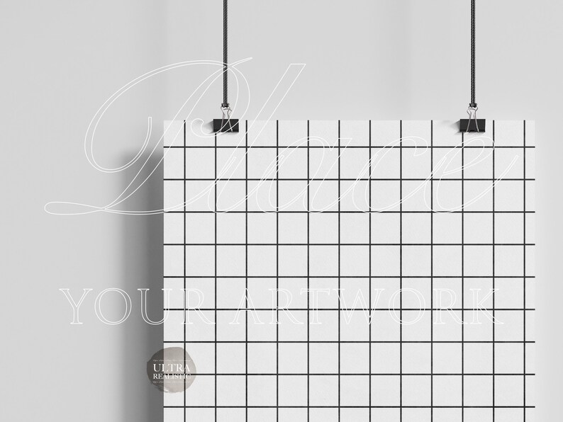 May include: A white poster with a black grid pattern hanging from the ceiling with black clips. The poster is blank and ready for your artwork.