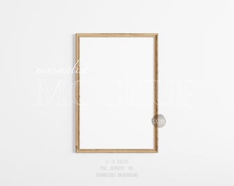 May include: A simple, minimalist mockup featuring a wood frame with a white background. The frame is on a white wall. The text "2:3 Ratio" is below the frame.