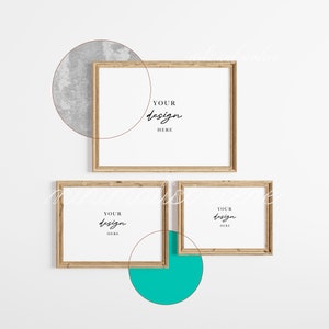 May include: Three wooden picture frames with white matting are displayed on a white background. The frames are arranged in a cluster, with the largest frame at the top and two smaller frames below. The text "YOUR design HERE" is written on the white matting.