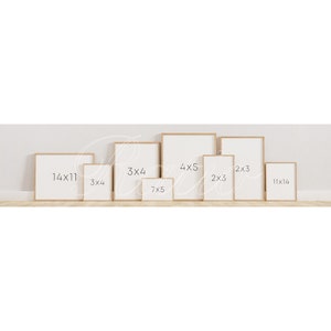 May include: A collection of wooden picture frames in various sizes, including 14x11, 3x4, 7x5, 4x5, 2x3, and 11x14 inches.