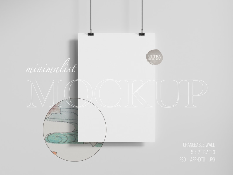 May include: A white poster mockup hanging from a string with a gray background. The poster is blank and has a subtle shadow. The text "minimalist MOCKUP" is written in white on the left side of the image. The text "ULTRA REALISTIC" is written in white on a gray circle on the right side of the image. The text "CHANGEABLE WALL 5:7 RATIO PSD AFFPHOTO JPG" is written in white at the bottom of the image.