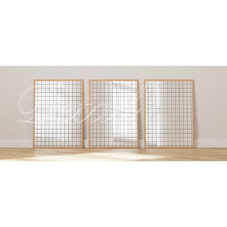 May include: Three rectangular mirrors with a grid pattern on the glass. The mirrors are framed in natural wood and are hanging on a white wall.
