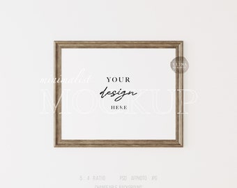May include: A brown wooden frame with a white background. The text "minimalist mockup" and "YOUR design HERE" is written in black on the frame. The text "ULTRA REALISTIC" is written in white on a black circle in the top right corner of the frame.