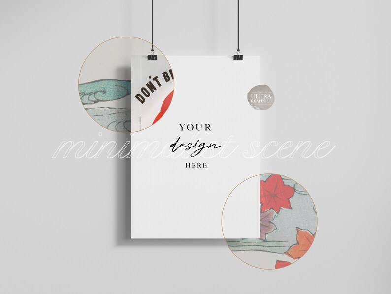 May include: A white poster mockup hanging from two clips with the text "YOUR design HERE" in black. The poster is surrounded by two circular frames with a Japanese-inspired design featuring blue and green waves, red flowers, and the text "DON'T BE" in red.