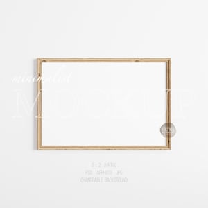May include: A simple, wooden frame mockup with a white background. The frame is a 3:2 ratio and is perfect for displaying artwork, photos, or other prints.