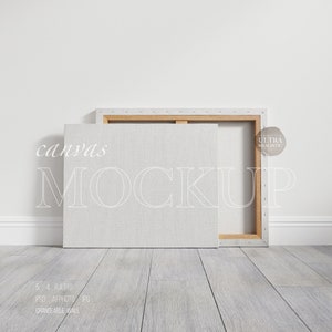 May include: A white canvas mockup with a wooden frame, leaning against a white wall. The canvas is blank and ready for your design. The text "canvas MOCKUP" is written in white on the canvas.