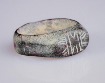 Anillo romano tardío de bronce con motivo radiante – 'Solinus' (III-V d. C.) – Eu 49 / Us 5