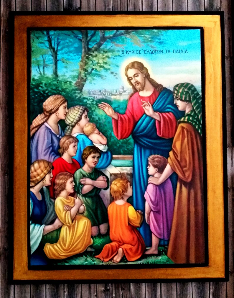 May include: A painting depicting Jesus Christ with children. The painting is framed in gold and features a blue sky with green trees in the background. The text "&Omicron; &Kappa;&Upsilon;&Rho;&Iota;&Omicron;&Sigma; &Epsilon;&Upsilon;&Delta;&Omicron;&Kappa;&Iota;&Mu;&Epsilon;&Iota; &Tau;&Alpha; &Pi;&Alpha;&Iota;&Delta;&Iota;&Alpha;" is written at the top of the painting.