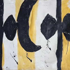 May include: An abstract painting featuring bold black shapes, including a large curved form and diamond-like figures, set against vertical bands of white and metallic gold. The composition includes black paint splatters and a small signature in the corner.