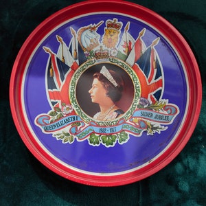 Queen Elizabeth II Silver Jubilee 1952-1977 Phillip 10” Blue Biscuit Tin England