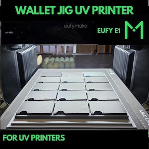 May include: A gray and black wallet jig for UV printers. The jig has 12 slots for wallets. The jig is labeled "EUFY E1" and "MAX 1.5mm".