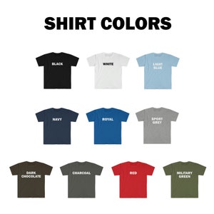 May include: A selection of t-shirts in various colors, including black, white, navy, light blue, royal blue, sport grey, dark chocolate, charcoal, red, and military green. Each shirt has a white text label indicating its color.