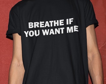 Puede incluir: Camiseta negra con texto blanco que dice "Respira si me quieres."