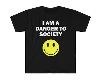 May include: Black t-shirt with white text that reads "I am a danger to society" and a yellow smiley face.