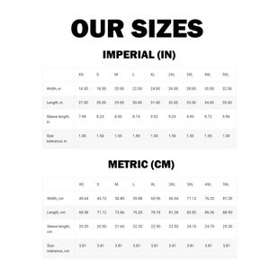 May include: Size chart showing measurements in inches and centimeters for different sizes of clothing, from XS to 5XL. The chart includes measurements for width, length, sleeve length, and size tolerance.