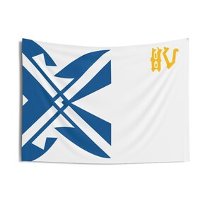 May include: White wall tapestry with a blue geometric design on the left side and yellow text on the right. The blue design features intersecting lines and shapes. The yellow text appears to be stylized initials or a logo.