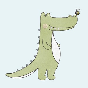 Può includere: Un coccodrillo verde di cartone animato con un sorriso pieno di denti e una piccola ape che vola sopra la sua testa. Il coccodrillo ha la pancia bianca e una lunga coda.