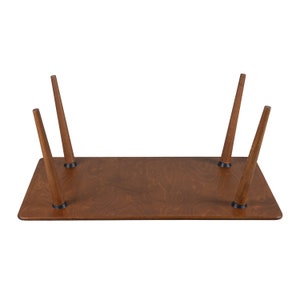Discover the Modern Oval Coffee Table for your home! This versatile walnut coffee table, made from pine wood, fits seamlessly with any living room furniture.