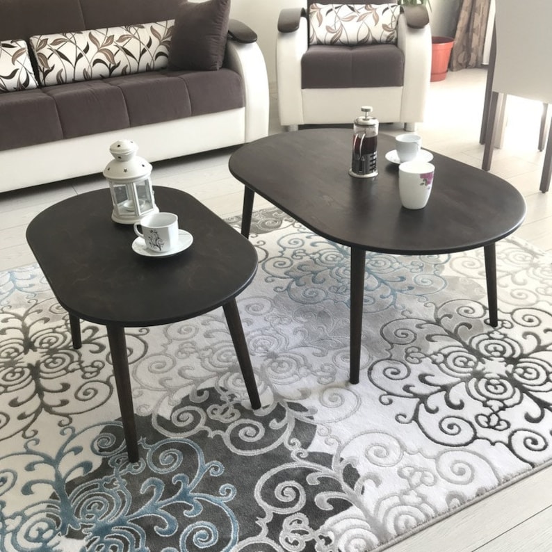 Here's small oval coffee table walnut wood! This coffee tables for small space will be perfect matches with your sofa or livingroom furnitures. Mid century modern middle table and minimalist table turns to rustic atmosphere!