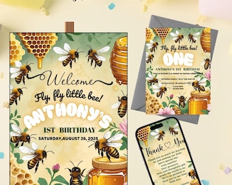 May include: A birthday bundle featuring a welcome sign, invitation card, and thank you card. The theme is bees and honey, with illustrations of bees, honeycombs, and jars of honey. The sign says "Welcome, Fly, fly little bee!" and "Anthony's 1st Birthday."