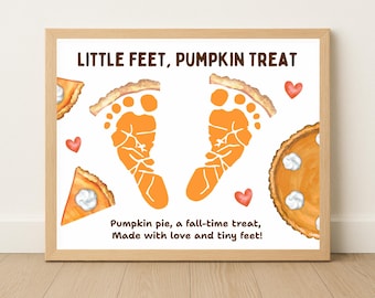 May include: A framed print with the text "LITTLE FEET, PUMPKIN TREAT". The artwork features orange footprints, pumpkin pie slices, and red hearts. The text below reads "Pumpkin pie, a fall-time treat, Made with love and tiny feet!"