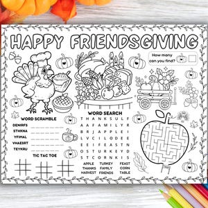 May include: Black and white Thanksgiving-themed activity sheet with the text "HAPPY FRIENDSGIVING". Features a turkey chef, word scramble, word search, tic-tac-toe, and a maze. Includes pumpkins, corn, and a wagon.